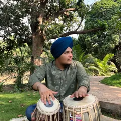 Enjoying a moment of peace and music in nature. The love of nature and art are languages that connect us all.