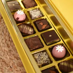My Fusion Treat Box is a curated collection of my best-selling fusion desserts. It includes bites of Pistachio Kunafa Brownies, Rose Kaju Katli, and Roasted Almond Chocolate.