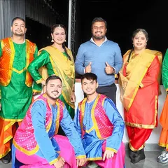 My team and I with a group of performers in vibrant Bhangra costumes for the Vatika Company Award Show. I handle everything from choreography to costumes to ensure a visually spectacular performance.