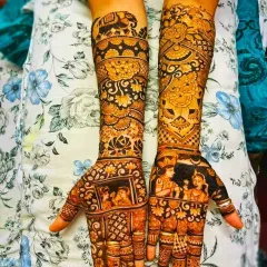 This design shows how I can weave multiple stories into one. The palms feature portraits of the couple, while the arms are filled with scenes and patterns that are meaningful to them, creating a rich tapestry of their journey.