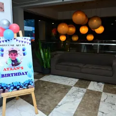 A welcome sign placed at the entrance of a party hall. I can design these signs to match the theme and color scheme of your event decorations.