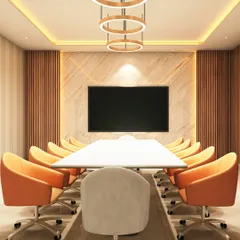The conference room at the school is designed for collaboration. I used warm wood paneling, a marble accent wall, and vibrant orange chairs to create an energetic yet sophisticated environment. The circular pendant lights add a modern, sculptural element.