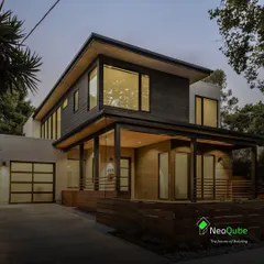 This two-story modern home concept features a warm wood exterior, a welcoming porch, and large windows. It shows how prefab design can be used to create a sophisticated and inviting family residence.