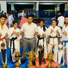 Hard work pays off, and I couldn't be prouder of my team. This picture was taken after the 13th state-level inter-dojo karate championship, where my students brought home a line of trophies, showcasing their skill in both Kata and Kumite.