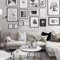 A well-designed gallery wall can define a room. This minimal Scandinavian layout uses a mix of thin black frames and monochrome art to create a clean, balanced, and sophisticated focal point above the sofa, proving that simplicity can make a powerful statement.