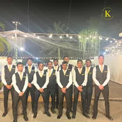 Our team of bartenders, looking sharp in their uniforms and ready to create an unforgettable event at Colaba Agiary. We pride ourselves on our professional appearance and service.