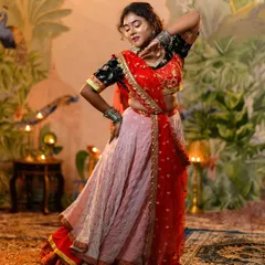 Feel the energy of Bollywood with our vibrant 'Ram Leela' inspired lehenga. The flowing skirt and intricately designed choli are perfect for a sangeet performance or a festive Navratri celebration.