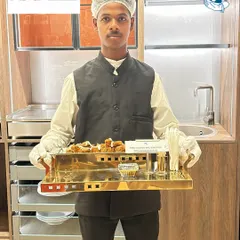Our professional service team in action at a Häfele India event. We ensure every detail is handled with finesse, from the food presentation on elegant serveware to the attentive service for your guests.