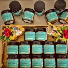 For a special birthday celebration, I created these custom-labeled jar candles as return favors. I can design labels to match any theme or branding for your event, making each gift truly unique.