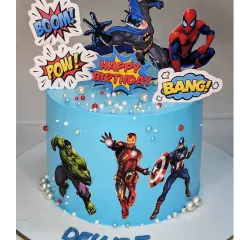 Assemble the heroes! This superhero cake brings together characters from the Marvel and DC universes for an action-packed celebration. It's a fresh pineapple flavor, proving that you don't need fondant to have a powerful theme.