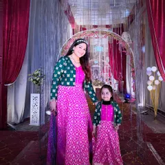 This is one of my favorite projects, where I upcycled an old silk saree to create these matching pink and green dresses for my daughter and me. It shows that old clothes can be transformed into something new and full of memories.
