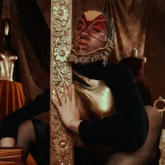 For this project, we crafted custom golden breastplates and ornate masks. The styling was inspired by themes of royalty and celestial elegance, set against a rich, textured backdrop to create a sense of ancient grandeur.