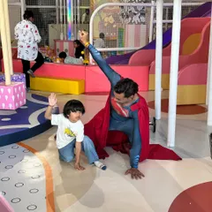 A young birthday boy strikes a superhero pose with Superman. Our mascot experiences create incredible photo opportunities and memories that last a lifetime.