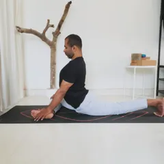 Stage 2 of Eka Pada Raja Kapotasana: Sinking and lifting. Here, we find the balance between grounding the hips and expanding through the chest.