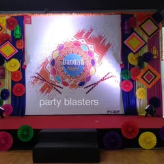 We create vibrant, culturally rich environments for themed corporate parties like this Dandiya night. The stage backdrop incorporates traditional motifs, bright colors, and dynamic lighting to capture the festive spirit of the celebration.