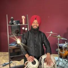 Ready for a music video shoot in a Mumbai studio. I am comfortable in front of the camera and enjoy the process of bringing music to life visually. Whether it's a classical piece or a fusion track, I bring my best tablas and my full dedication to the set.