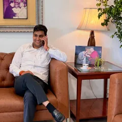 Taking a client call from the seating area in my office. I make it a point to be accessible and keep you updated on the progress of your case.