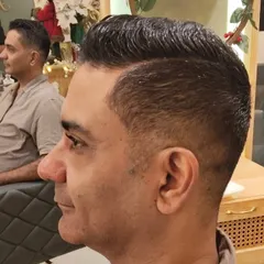 The final result of a precision haircut. I focus on the details, whether you want a modern fade or a timeless classic style, to create a look that is sharp, clean, and tailored to you.