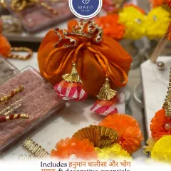 Each of my Hanuman Chalisa hampers includes bhog prasad and other decorative essentials, like this beautiful orange potli, perfect for gifting or hosting a sacred gathering.