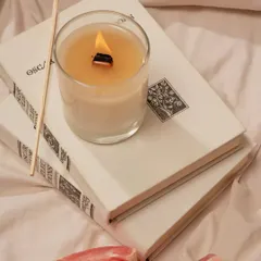 It's time for a little "re-wax-ation". This is one of my custom jar candles featuring a wooden wick, which makes a gentle crackling sound as it burns. It's the perfect companion for a quiet evening with a good book and your favorite scent.