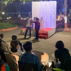 Bringing a young volunteer on stage during an outdoor show in Alibag. I make sure even the youngest audience members get a chance to be a part of the magic, creating a fun and inclusive experience.