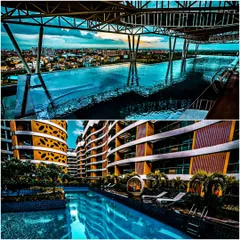 A closer look at the pools at Palm Bellagio. The rooftop infinity pool offers panoramic city views, while the ground-level pool is nestled within the building's curves, creating two distinct recreational experiences.