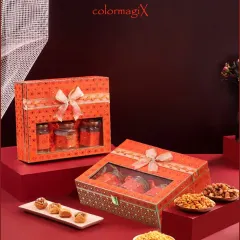 Our windowed gift boxes offer a preview of the festive treats inside. This matching set in a vibrant orange pattern is perfect for corporate orders, filled with gourmet snacks and sweets.
