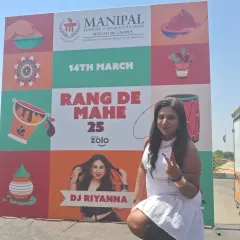 Posing in front of the official event banner for Rang De Mahe '25 at Manipal University's Bengaluru Campus. It was an honor to be the featured DJ for their celebration.