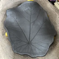 This is the leaf platter in its 'greenware' stage, before it was fired. You can clearly see the delicate impression of the real leaf I used to create the texture, capturing its natural beauty in raw clay.