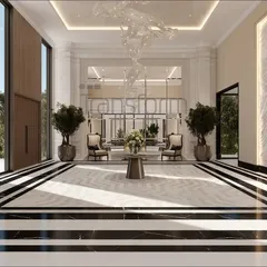 In this entrance, grandeur and proportion converge to create a sanctuary of contemporary luxury. A large mirror reflects the open courtyard, extending its elegance and creating a boundless sense of space, while the bold marble flooring guides the journey inward.