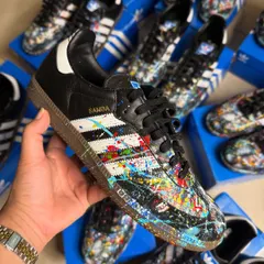A close-up of one of nine hand-painted Adidas Sambas for a private corporate client. This abstract splatter design shows how I can execute a cohesive theme across a bulk order, perfect for unique corporate gifting.