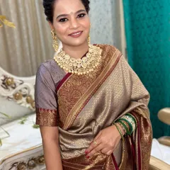 A close-up of the mother's makeup. The look is elegant and age-appropriate, with a focus on glowing skin and a classic feel.