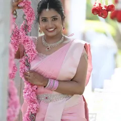 Capturing that moment of pure joy is what I live for. Dr. Namratha looks absolutely radiant during her outdoor ring ceremony. For this daytime event, I used a fresh and natural makeup palette to enhance her features, ensuring she looked and felt like the best version of herself in her beautiful pink silk saree.