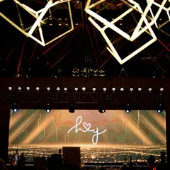 The stage backdrop featured a massive LED screen with custom graphics, perfectly integrated with the overhead lighting design.