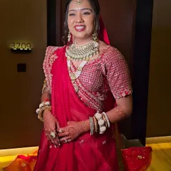 A happy and radiant bride. This close-up shows how the makeup looks natural yet polished, allowing her joyful expression to be the main focus.