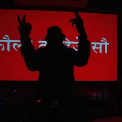 My name in lights, my silhouette at the decks. This is the iconic shot, with the Hindi "Follow DJ Sau" branding setting the stage for a massive night.
