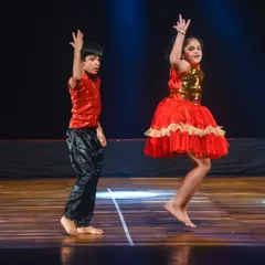 Two of our youngest dancers captured in a moment of joyful movement. This shows that even the smallest performers can learn to express themselves and shine on stage with our guidance.
