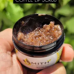 A close-up shot of the Coffee Lip Scrub. You can see the real coffee grounds and sugar crystals that work to heal chapped lips and provide complete hydration.