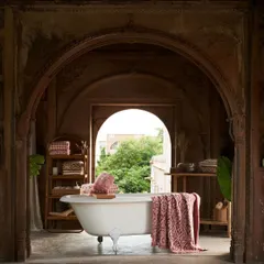 For the 'Spice Market' collection, we created a luxurious bathroom scene within a historic setting. The framing through the archway adds depth and makes the scene feel like a private sanctuary.
