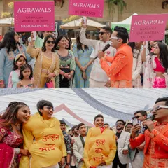This carnival wedding celebration was a whole mood. We organized a "ladkewale vs ladkiwale" showdown with fun signs and games that had both families showing their competitive spirit.