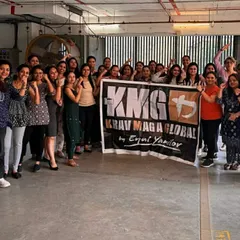 Holding our KMG banner high after an impactful women's self-defense workshop for a global logistics provider. We are committed to bringing safety training to women across all industries.