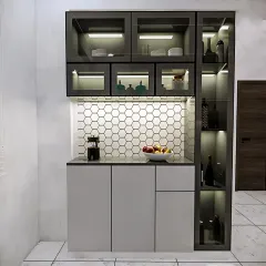 This contemporary crockery unit features a hexagonal tile backsplash and a mix of solid and glass-front cabinets. Integrated lighting beautifully showcases the items on display.