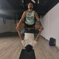 This acro yoga pose is a beautiful display of balance and trust. The base provides a solid foundation while the flyer floats in a supported lotus pose. It’s a journey of self-discovery and connection you take together.