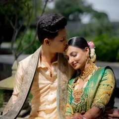 Creating a cohesive look for the couple is essential. Here, the bride's traditional elegance is perfectly matched by the groom's subtle, clean makeup, ensuring they both look their absolute best for their wedding portraits.