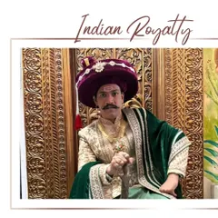 Indian Royalty. Our client looks every bit the part of a Peshwa, seated on a throne in our golden embroidered Peshwai attire with a velvet green shawl.