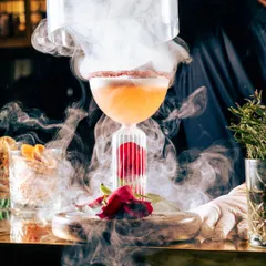 Elevate your day with a tantalizing cocktail from our luncheon and sundowner menu. This smoky, rose-infused creation offers a spirited escape into pure indulgence.