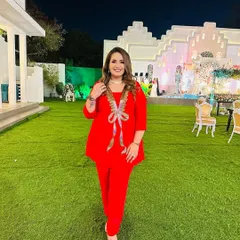 Another look at this stunning red co-ord set. It's a versatile outfit that can be dressed up or down for any occasion.