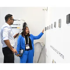 Our founder, Neha, demonstrates our range of smart keypad options to a client. In the background, you can see the integrated Drainvac system, showcasing how we combine intuitive control with powerful air quality hardware for a complete home wellness package.