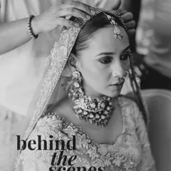 A behind-the-scenes moment of the bride getting her dupatta set. These quiet, preparatory moments, filled with anticipation and the helping hands of loved ones, are a beautiful part of the wedding story.