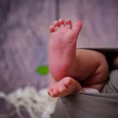 Ten tiny toes. This close-up shot of a baby's feet is a simple, yet powerful reminder of just how small and perfect they are.